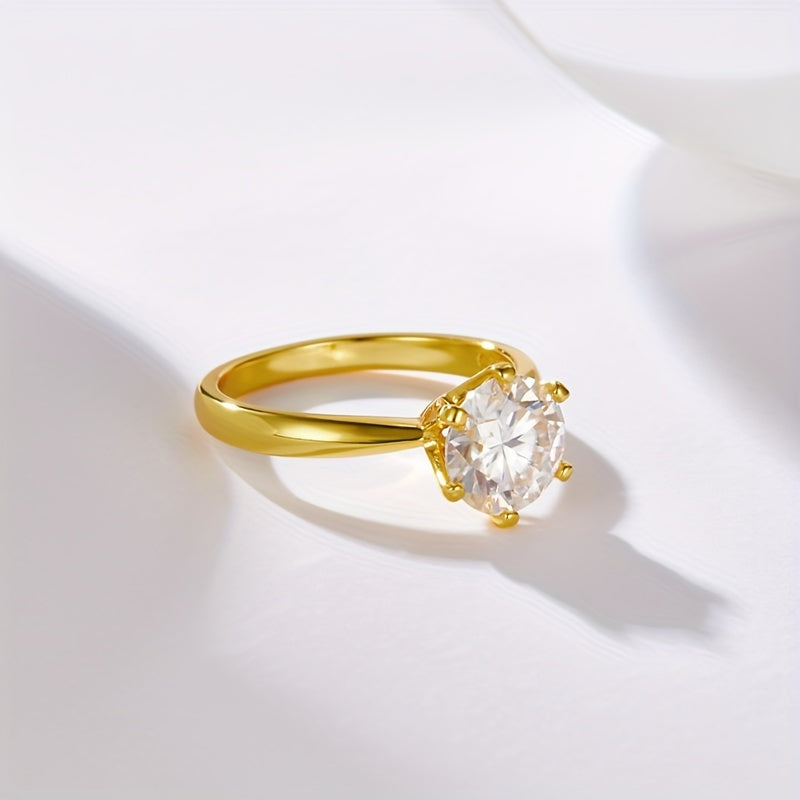 Pierścionek z moissanitem, ze srebra 925 pokrytego 18-karatowym złotem.